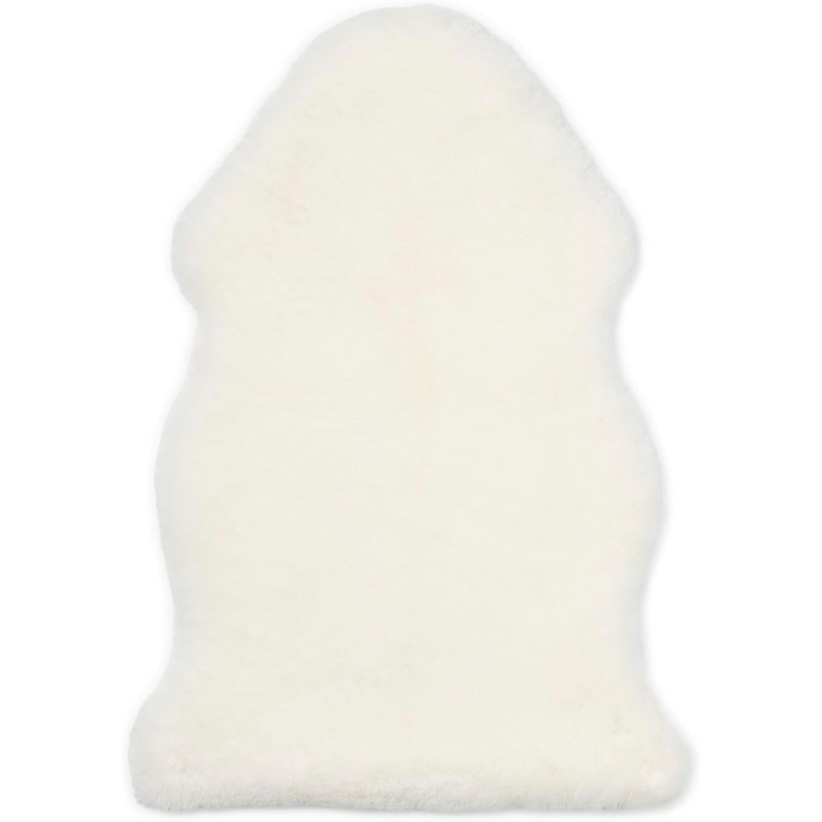 Peaux de mouton & coussins blancs